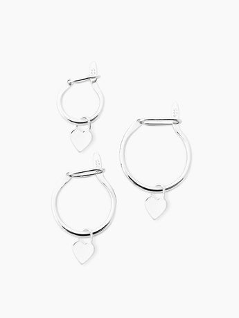 sterling silver huggie hoops with dangling heart charms