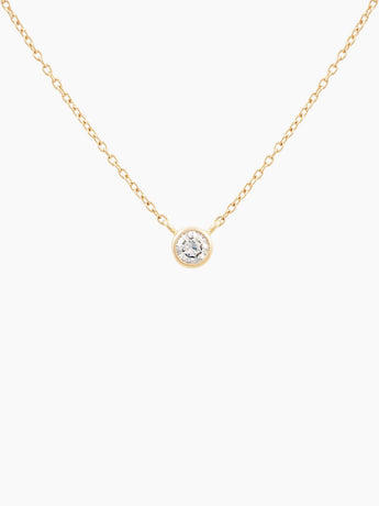 Gold necklace with a 1/8ct diamond pendant on a white background