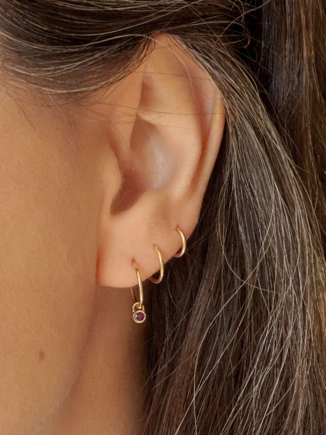 Solid gold and ruby charms for huggie hoops